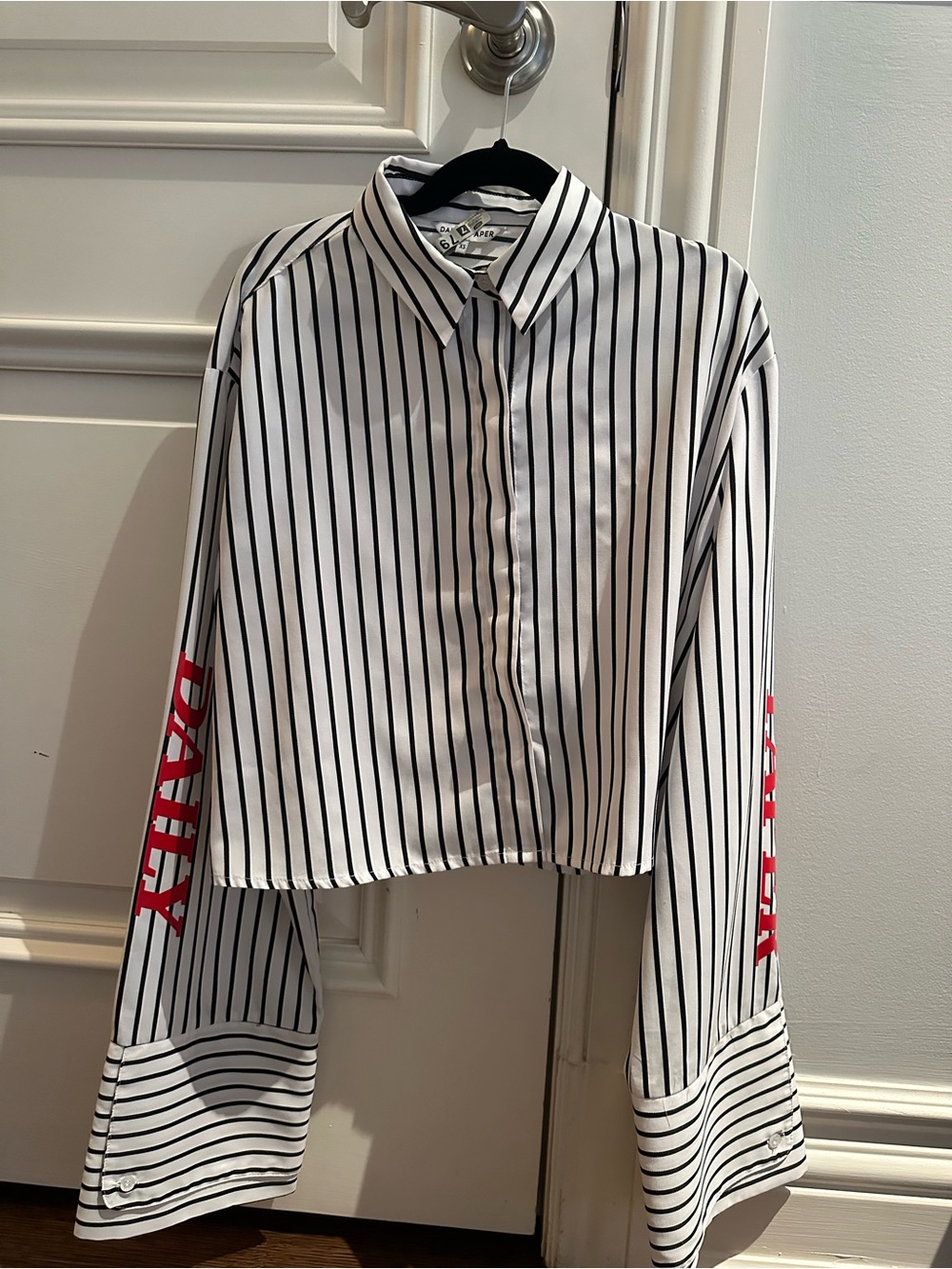 Daily Paper Button-Front Crop Shirt with Red Logo on Sleeves.